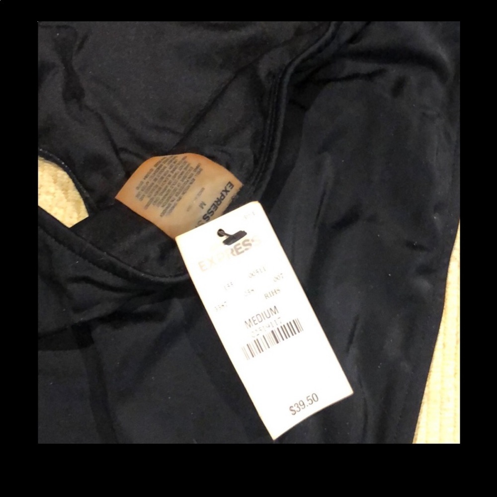 Express black monkini sz M never worn.